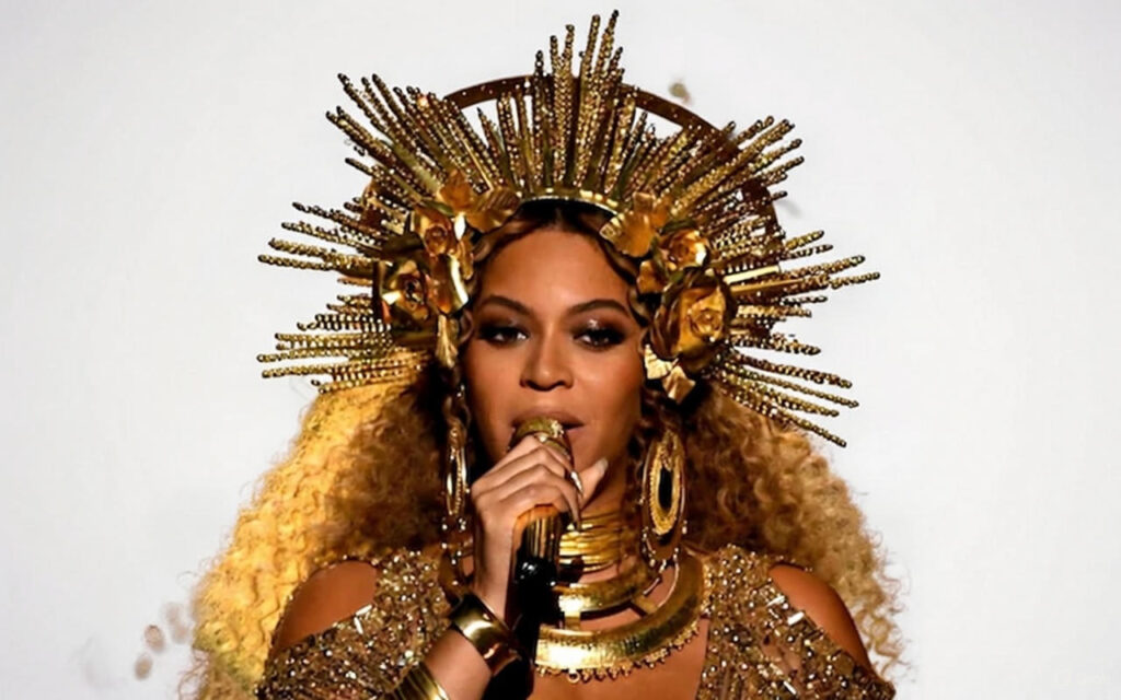 Beyonce net worth explained with symbols of touring revenue, music catalog royalties, and business brands.